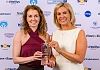Orlaith Talty, left, from The Powerhouse Newry receives her award for the Best Businesswoman at the Greater Newry Business Awards. Talty is pictured here receiving her trophy from Gemma Murphy, Murphy Jewellers, Sponsors. Photograph: Colum Lynch Photography