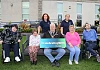 Council Chairperson Councillor Glyn Hanna, visits Mourne Stimulus, one of his chosen charities for the year, to launch the Council's Annual Civic Awards and the #CelebratingWHO campaign. Pictured front from left are Heather Wilson, Marina Joyce, Chairperson Councillor Glyn Hanna, Joanne McVerry and William Houston. Back: Bronagh Trainor, Community Fundraiser, and Gemma Phillips, DCW Care Worker.