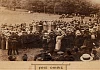 Photograph of Omeath Feis,1913. First held in August 1901, the event was organised by the Newry, Dundalk and District branches of the Gaelic League. Competitions included Irish dancing, singing, storytelling, writing, music and spinning.  Newry & Mourne Museum Collection