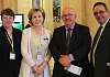  SDLP Newry and Armagh MLA Dominic Bradley presents a petition to Assembly Speaker William Hay with Martina Marks and Joan McParland, Newry & Mourne ME-Fibromyalgia Support Group.