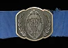 Queen’s Institute of District Nursing belt buckle.   Down County Museum Collection.