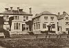 A Postcard showing Mourne Grange School in the 1920s. The original Drumindoney House can be seen on the left with the 1904 extension in the centre which contained a dining hall on the ground floor and dormitories above. Further classrooms were in the building on the right. Newry and Mourne Museum Collection