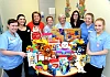 Staff from the Children’s Ward at Daisy Hill Hospital and Chair of the Southern Health and Social Care Trust, Roberta Brownlee with the generous toy donation from the Friends of Daisy Hill Hospital.