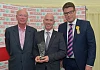 Philip Morgan from Around Noon is pictured accepting the Best Direct to Store Supplier Award at the annual Henderson Wholesale Local Supplier Awards, which took place at the Balmoral Show. Pictured presenting the award is agri-business journalist and judge of the awards, Sam Butler (left) with Neal Kelly (right), Fresh Foods Director at Henderson Wholesale.