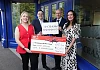 CRASH Services staff Michelle Murphy, Operations Director; Paul O’Hare, Finance Director and Steve Beighton, I.T Director present cheques to  Kerry Anderson, Head of Fundraising at Air Ambulance NI 