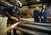 Mike Mathers, Director of BM Steel, and Alison Gowdy, Invest NI at the Lislea premises of BM Steel. Photograph: Kelvin Boyes