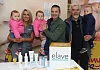 Triplets Rosie, Evie and O&iacute;sin, pictured with dad Brian Walsh and grandad Gerry Morgan, receive advice from Aoife Downey, Manager of Medical Hall Pharmacy, Quays Centre, at the Sensitive Skincare Showcase organised by NI premature baby charity TinyLife and Elave Skincare. The triplets were born 2 months premature.