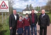 Cathal Boylan, MLA and Cllr Darren McNally with Foley Primary School principal, Mr Kelly and pupils at the school.