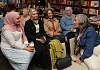CDHN Director Joanne Vance, right, chatting to guests at the Migrant Women Seen and Heard in Indie News Week event at The Bookshelf in Newry. Photograph: Columba O'Hare/ Newry.ie