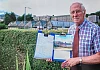 Bessbrook resident John Davis with his petition