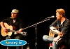 Matt McGinn singing 'In the round' at Sean Hollywood Arts Centre with Gareth Dunlop looking on. Photograph: Columba O'Hare 