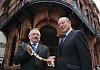 Newry-man Michael Hannaway is pictured handing over the chain of office to incoming RICS Northern Ireland Chairman, Paul Kendrick. Photograph: Press Eye