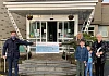 James McCaffrey accepts a cheque from the organisers of Santa's Cottage for the Southern Area Hospice.