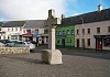A replica of the Drumadonnell Cross on the Upper Square at Castlewellan by Eric Jones, CC BY-SA 2.0 , via Wikimedia Commons