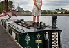 Lorraine Fox stands on her Sandwich Barge, moored at the Albert Basin in Newry, but four years on she still can't get a trading license. Photograph: Columba O'Hare/ Newry.ie 