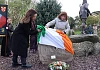 Sinn Fein President Mary Lou McDonald and Newry and Armagh MLA Liz Kimmins unveiling a stone in memory of Máire Drumm.