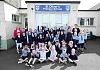 Liz Kimmins joins pupils at St Oliver’s Primary School, Carrickrovaddy, Cullyhanna along with school Principal Mrs Donagahy, as new temporary 20mph speed limit signs are switched on outside the school to improve road safety for pupils, parents and staff. 