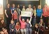 Autism Mums group with their cheque.