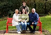 Caoimhe Loughran from Newry with her parents Leona and Collie and brother Eoin at the British Heart Foundation bench installed in living tribute to Caoimhe, who had a pacemaker fitted at just 20 years of age, due to an underlying heart condition. The iconic red bench is situated in Kilbroney Park in Rostrevor.