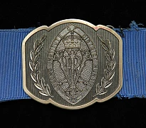 Queen’s Institute of District Nursing belt buckle.   Down County Museum Collection.