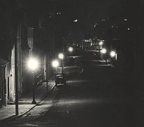 Photograph of Bridge Street, Newry, lit by gaslight. Newry and Mourne Museum Collection