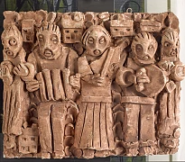 Plaster model of a detail of Proud People which depicts three traditional Irish musicians including an accordion player, a fiddler and someone playing the bodhran Newry and Mourne Museum Collection.