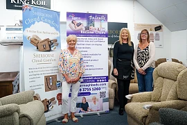 Kathryn Murdock and Sharon Dalzell from Dalzells Beds with Mandy Wilson, Age NI Charity Director, in the Dalzells Beds showroom in Markethill marking the launch of the new partnership supporting better sleep, comfort and independent living across Northern Ireland.