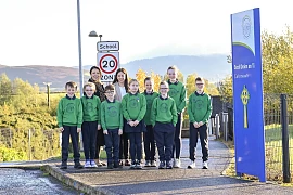 Infrastructure Minister Liz Kimmins is pictured at Dromintee Primary School with Ailish McNaughton and pupils from the School Council.