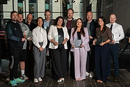 Associate Senior Teacher Michael Fegan and Vice Principal Helen Doherty along with other award winners at St Colman's.
