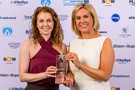 Orlaith Talty, left, from The Powerhouse Newry receives her award for the Best Businesswoman at the Greater Newry Business Awards. Talty is pictured here receiving her trophy from Gemma Murphy, Murphy Jewellers, Sponsors. Photograph: Colum Lynch Photography