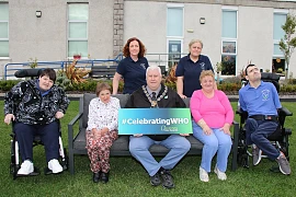 Council Chairperson Councillor Glyn Hanna, visits Mourne Stimulus, one of his chosen charities for the year, to launch the Council's Annual Civic Awards and the #CelebratingWHO campaign. Pictured front from left are Heather Wilson, Marina Joyce, Chairperson Councillor Glyn Hanna, Joanne McVerry and William Houston. Back: Bronagh Trainor, Community Fundraiser, and Gemma Phillips, DCW Care Worker.