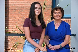  Chloe Coughlan is congratulated by Mrs McAlinden on achieving an exceptional 10 A* grades.