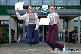 In joyful form at A Level results day at Sacred Heart Grammar School are twins Edana and Alene Butterfield from Mayobridge. Photograph: Columba O'Hare/ Newry.ie 