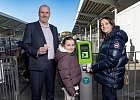Translink's Paul Irvine with customers Olivia & Christine Fisher at a validator