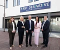 Economy Minister Dr Caoimhe Archibald, First Minister Michelle O’Neill, Andrew Colhoun, Head of First Derivative, deputy First Minister Emma Little-Pengelly and Kieran Donoghue, Chief Executive of Invest NI pictured at today's job announcement in Newry.