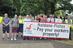 Liz Kimmins MLA and Dáire Hughes MP ón the picket line with the Haldane Fisher strikers.