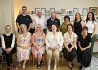 Judges Tom Dowling and Annamarie Delaney are pictured at the organisation’s office with, front row l-r, Liz Kimmins MLA, Minister for Infrastructure NI; Monica Heaney, Founder; judges Tom Dowling and Annamarie Delaney; Tricia O’Neill, Co-founder and Charity Development Officer; Councillor Doire Finn, Deputy Chairperson of NMDDC; and committee members, councillors and guests.