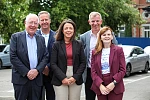 Discussing the Newry flood protection scheme are from left: Rory McShane, Chairperson, Newry BID (Business Improvement District), Gary Quinn, Director of Rivers Operations, Department for Infrastructure, Infrastructure Minister Liz Kimmins, Economy Minister Dr Caoimhe Archibald, and Eamonn Connolly, Newry BID Manager.
