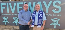 Newry City AFC Chairman Gary Wilson with Fiveways owner Colm Meehan.