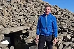 MLA Justin McNulty at the cairn on Slieve Gullion