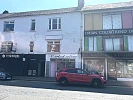 Photo taken by author of the buildings on the Mall that currently occupy the site where the old dispensary and committee rooms were located.