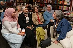 CDHN Director Joanne Vance, right, chatting to guests at the Migrant Women Seen and Heard in Indie News Week event at The Bookshelf in Newry. Photograph: Columba O'Hare/ Newry.ie