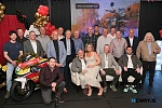 A who's who of the motorcycling world at Crossan Motorcycles 40th anniversary: Included are back from left: Mike Brown, Ian Simpson, Philip McCallan, Brian Morrison, Eddie Laycock, Ian Duffus, Brian Reid, Ian Lougher, Ryan Farquhar, Glen Irwin, Adrian Archibald, Alan Irwin, Wayne Kirwan, Geoff McMullan and Jim Dunlop. Front from left: Sam Dunlop, Giacomo Agostini, Anne Marie Fegan, Adrian Fegan and Michael Dunlop. Photograph: Columba O'Hare/ Newry.ie 
