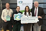 Newry Mourne and Down Policing and Community Safety Partnership (PCSP) Chairperson, Councillor Henry Reilly (right) at the Newry Health and Wellbeing event with PSNI Crime Prevention Officer Tom Jameson, PSNI Constable Flannigan and PCSP Officer Kaitlyn Martin.