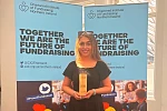 Hannah Babe receiving her Fundraising Volunteer of the Year award at the Institute of Fundraising Awards.
