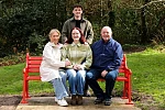 Caoimhe Loughran from Newry with her parents Leona and Collie and brother Eoin at the British Heart Foundation bench installed in living tribute to Caoimhe, who had a pacemaker fitted at just 20 years of age, due to an underlying heart condition. The iconic red bench is situated in Kilbroney Park in Rostrevor.