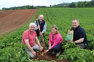 Sampling the first of this year's Comber Earlies: Co Down potato grower, William Gilmore (left) and Joanne Weir from Wilson's Country. Joining them were Nigel Doherty and Stephen Galbraith (right), from TESCO