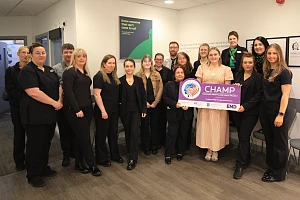 The Specsavers Newry team with Fiona McNaughton from Women’s Aid Armagh Down. 