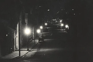 Photograph of Bridge Street, Newry, lit by gaslight. Newry and Mourne Museum Collection