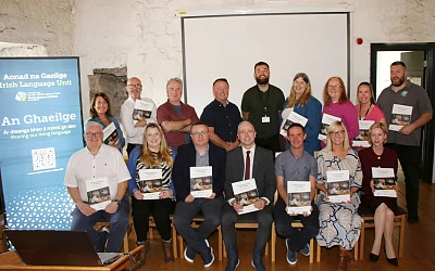 Newry, Mourne and Down District Council has launched a new Irish language training resource and associated online materials to support local government officers who wish to learn Irish and use it in their day-to-day work. Staff and councillors were joined at the launch by Irish Language Commissioner, Dr Pól Deeds (front centre) and NMDDC Corporate Services Director Aileen Jones (front right).